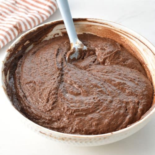 Stirred Date Chocolate Cake batter in a bowl.