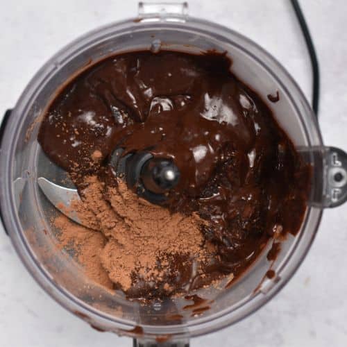 Healthy Chocolate Frosting ingredients in a food processor.