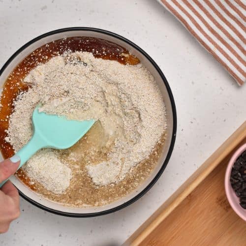 Stirring Healthy Edible Cookie Dough base ingredients.