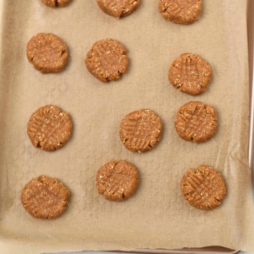 Oat Flour Peanut Butter Cookies ready to bake on a cookie sheet.