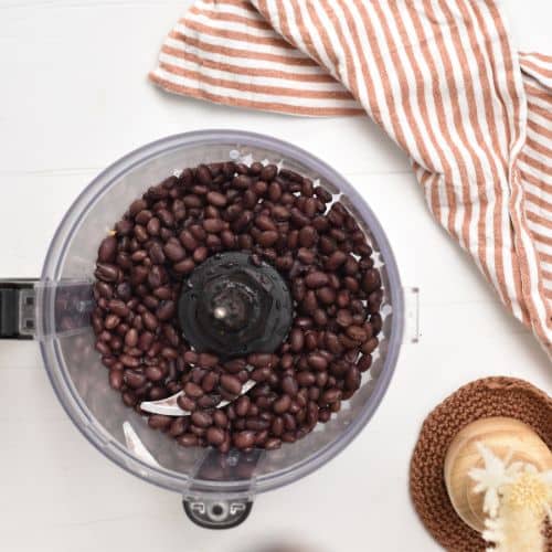 Black bens in a food processor.