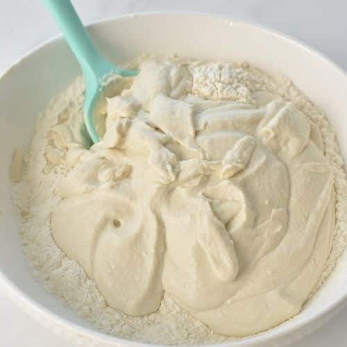 Adding blended tofu to the dry Protein Scone ingredients.