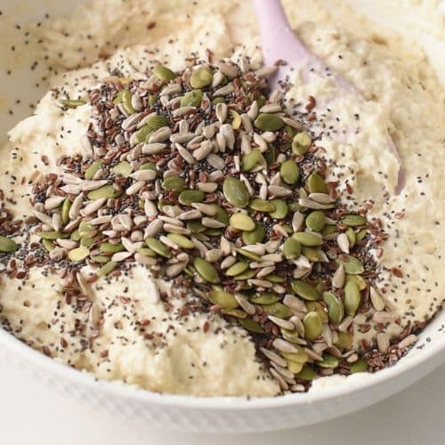 Adding seeds to the Yogurt Bread dough.