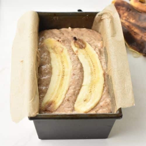 Buckwheat Banana Bread ready to bake on a baking pan.