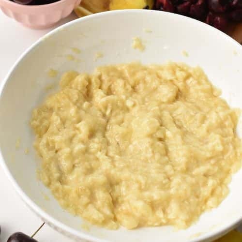 Mashed bananas in a bowl.