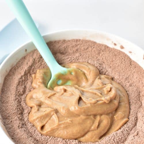 Adding date mixture to the dry Chocolate Date Muffin ingredients.