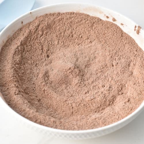 Dry Chocolate Date Muffin ingredients in a bowl.