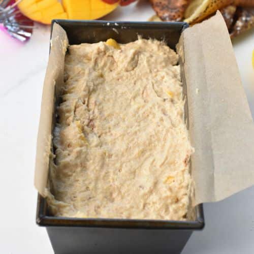 Mango Banana Bread batter in the loaf pan.