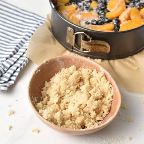Crumble for the Peach Blueberry Cake in a bowl.