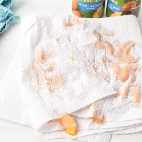 Pat drying the Peach slices.