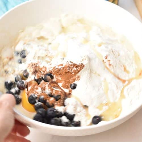 Peach Fritter ingredients in a bowl.