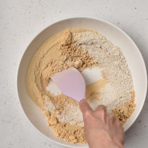 Mixing Peanut Butter Protein Bar ingredients.