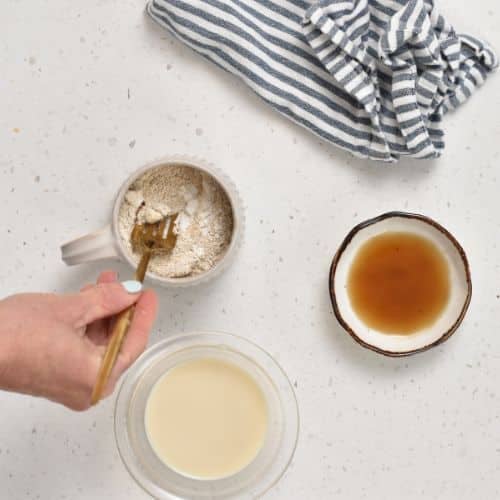Combining dry Peanut Butter Protein Mug Cake ingredients.