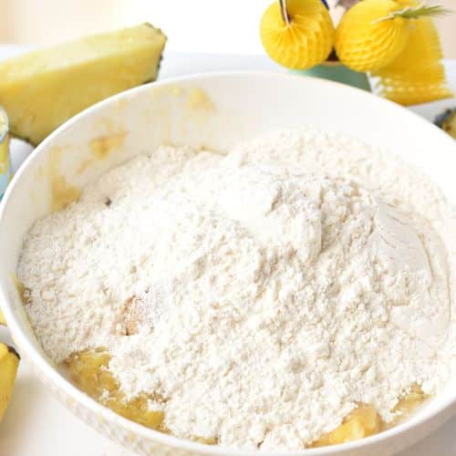 Adding flour to the bananas.