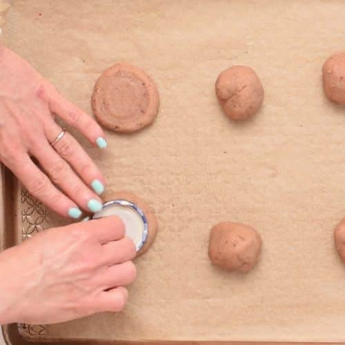 Flattening the top of Almond Flour Strawberry Cookies.