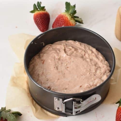 Strawberry Jam Cake in a springform pan ready to bake.
