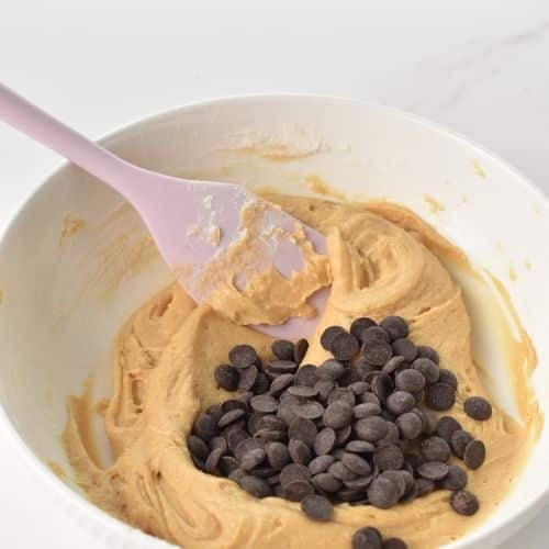 Chocolate Chip Condensed Milk Cookie ingredients in a bowl.