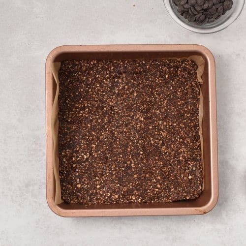 Pressed Chocolate Granola Bars in the pan.