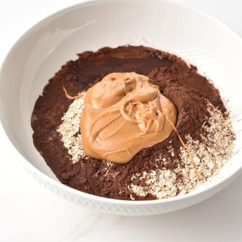 Chocolate Granola Bars ingredients in a bowl.