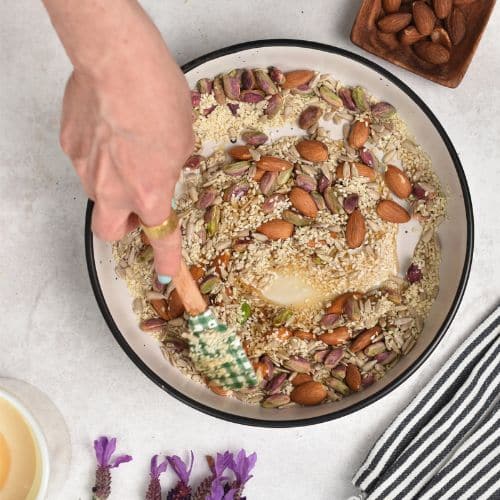 Stirring Seed and Nut Cluster mixture.